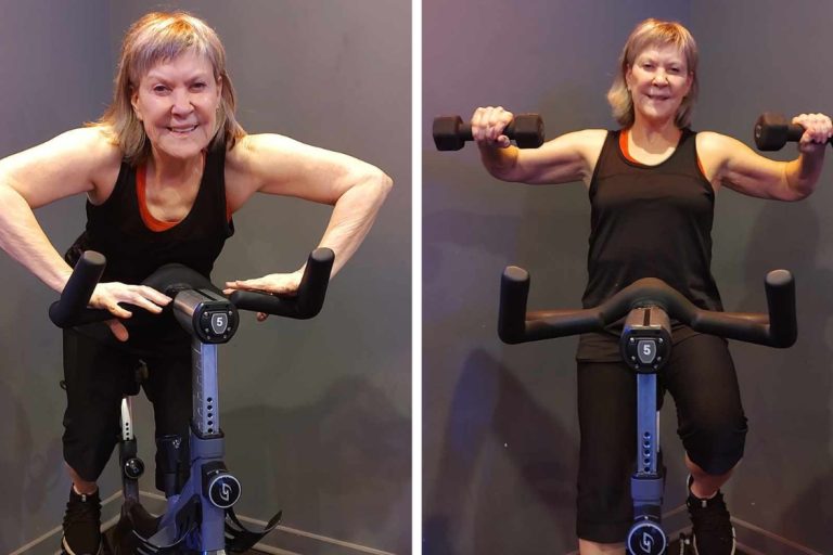 senior woman riding on spin bike and lifting weights